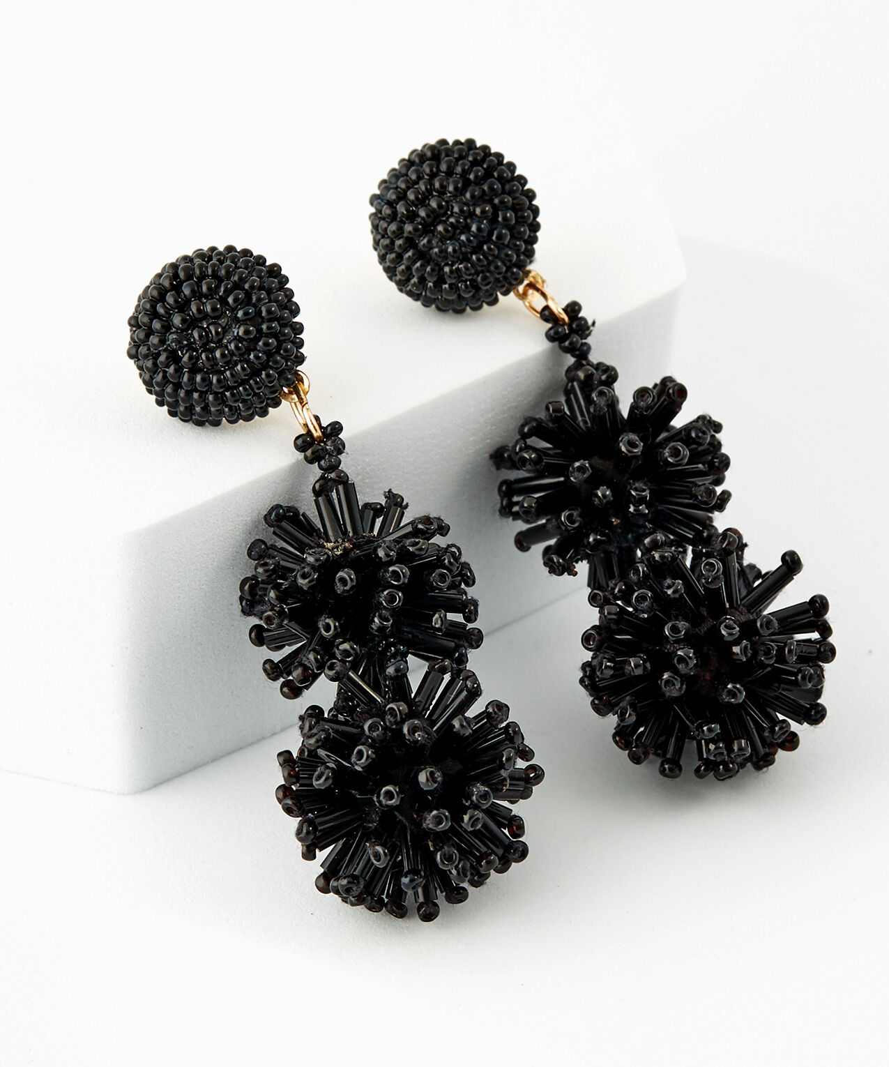 Black Sea Bead Pom Long Earrings