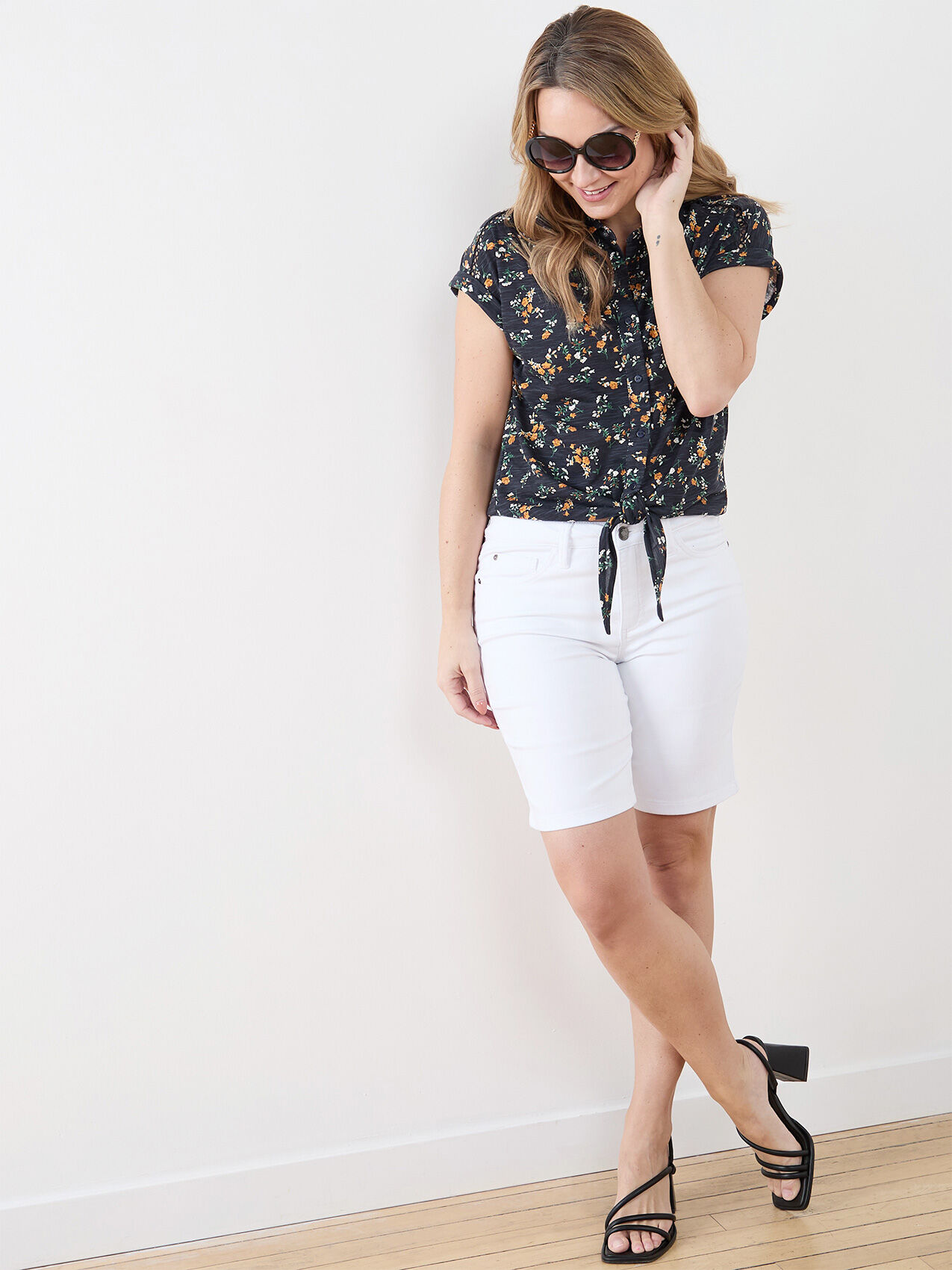 White distressed shorts 2025
