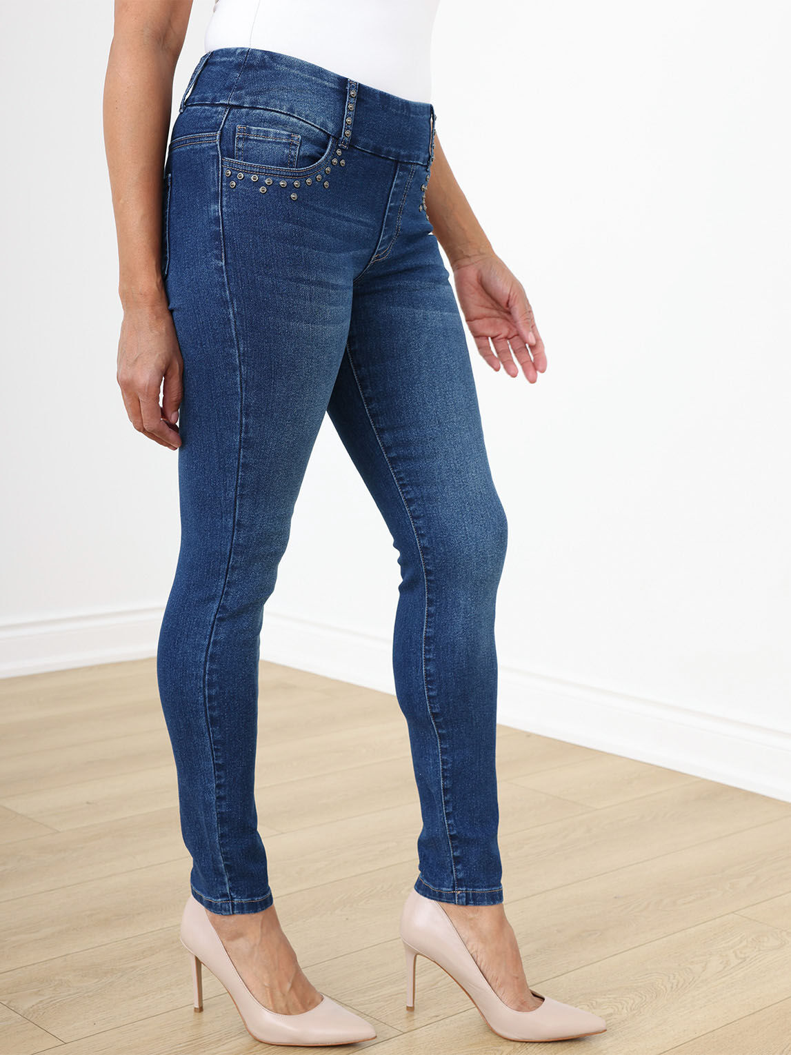 Medium Wash Slim Leg Jeans with Studs by GG