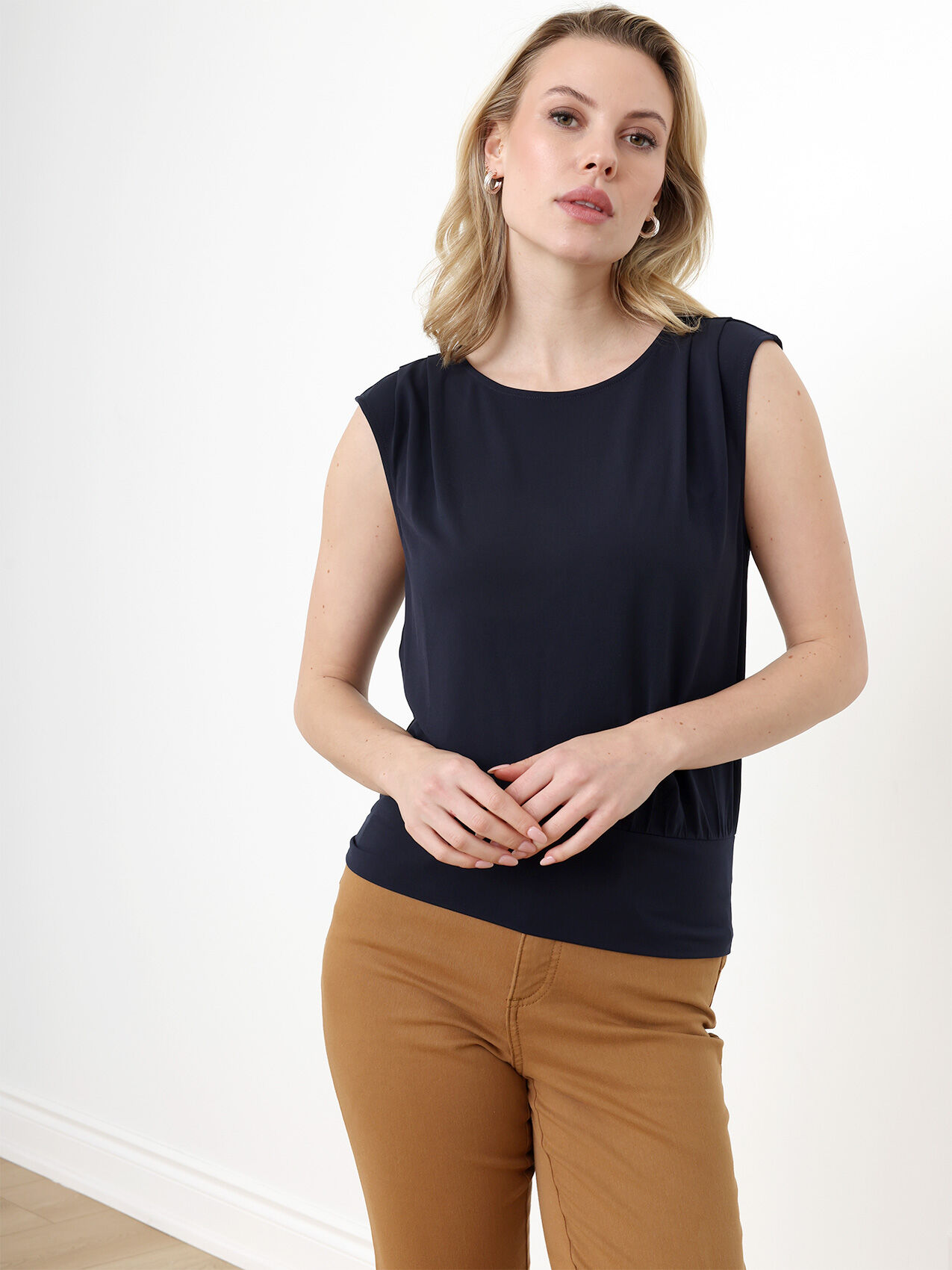 Sleeveless Stretch Top with Banded Hem