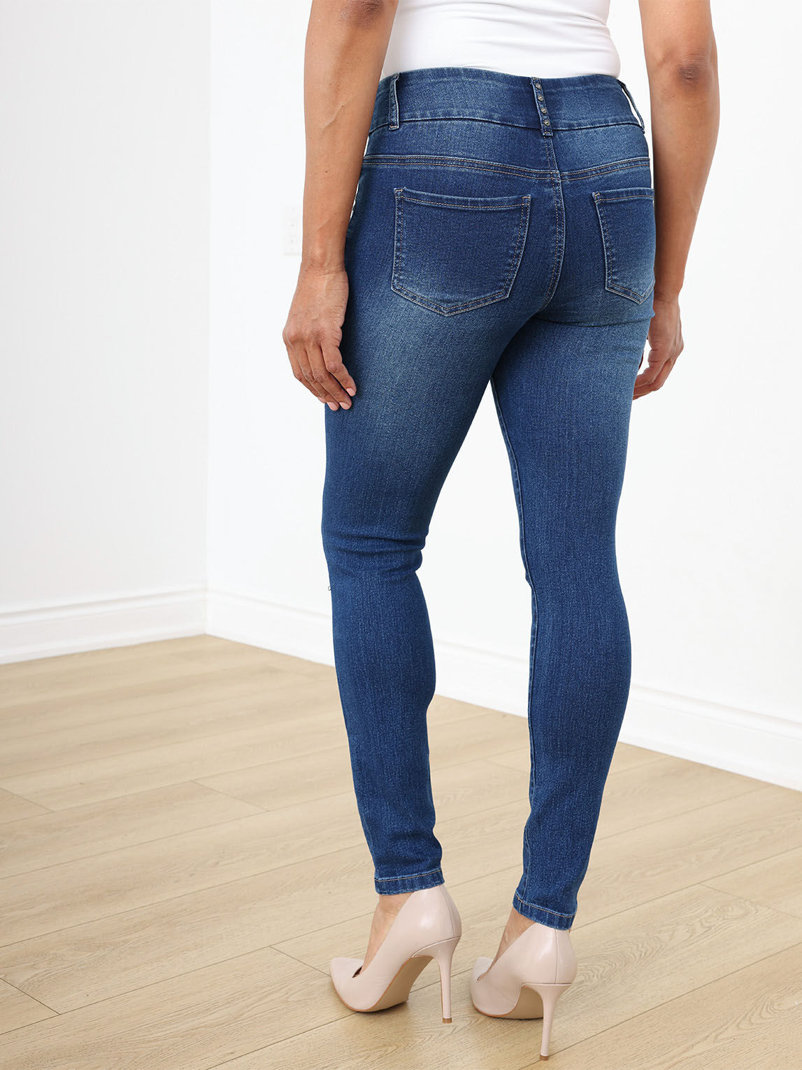 Medium Wash Slim Leg Jeans with Studs by GG