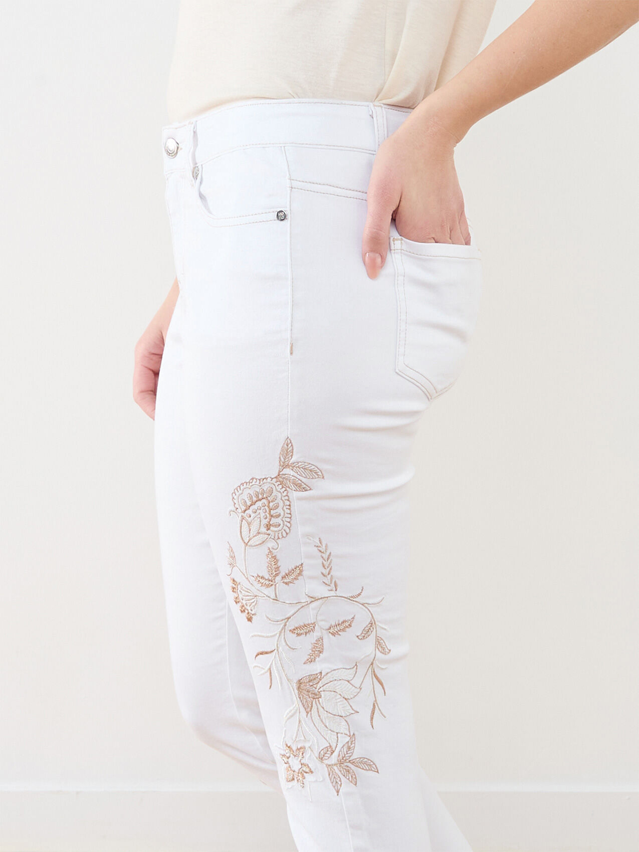 White jeans with embroidery on legs on sale