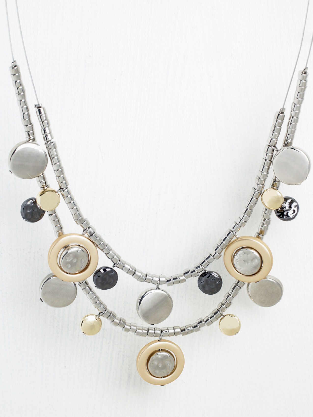 Mixed metal store layered necklaces